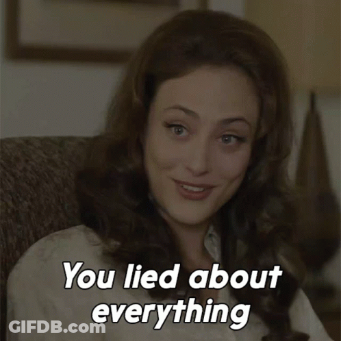 A Woman Sitting In A Chair With The Words " You Lied About Everything " On The Bottom GIF
