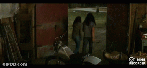 A Woman Sitting In A Red Car With Mobi Recorder Written On The Bottom Of The Screen GIF