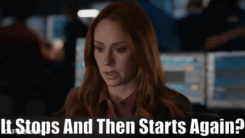 A Woman Sitting In Front Of A Computer With The Words " It Stops And Then Starts Again " Written Below Her GIF