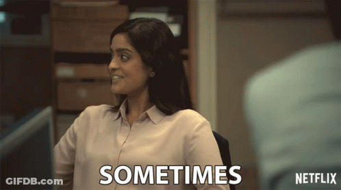A Woman Sitting In Front Of A Computer With The Words Sometimes Written On Her Shirt GIF