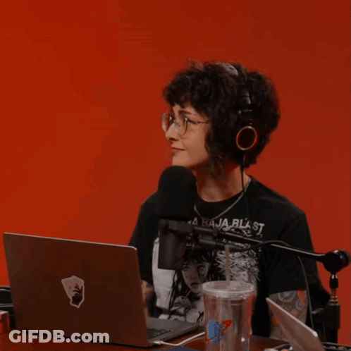 A Woman Sitting In Front Of A Microphone With The Word Parlay Written On The Bottom GIF