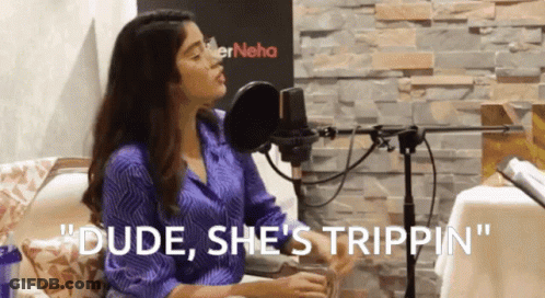 A Woman Sitting In Front Of A Microphone With The Words " Dude She 'S Trippin " GIF