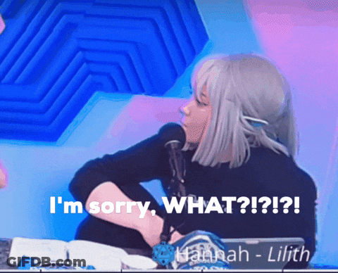 A Woman Sitting In Front Of A Microphone With The Words " I 'M Sorry What ? " GIF