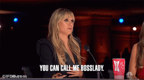 A Woman Sitting In Front Of A Microphone With The Words You Can Call Me Bosslady GIF