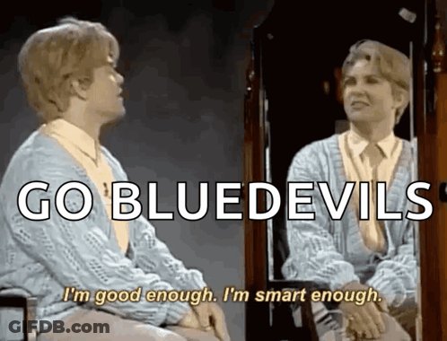 A Woman Sitting In Front Of A Mirror With The Words Go Bluedevils Written Above Her GIF