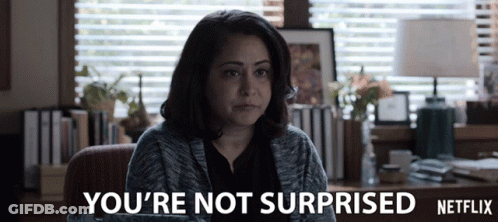 A Woman Sitting In Front Of A Window With The Words You 'Re Not Surprised Netflix GIF