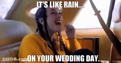 A Woman Sitting In The Back Seat Of A Car With A Caption That Says It 'S Like Rain On Your Wedding Day . GIF