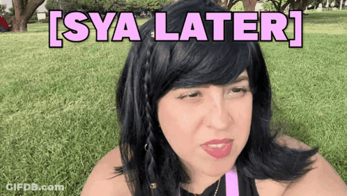 A Woman Sitting In The Grass With Sya Later Written On The Bottom GIF
