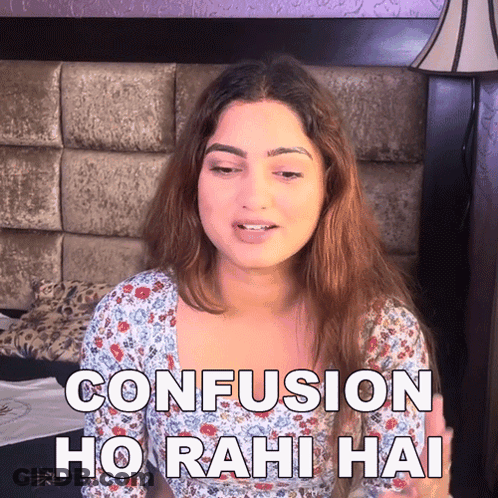 A Woman Sitting On A Bed With The Words Confusion Ho Rahi Hai Above Her GIF