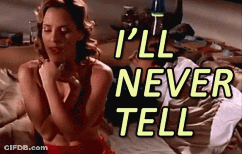 A Woman Sitting On A Bed With The Words " I 'Ll Never Tell " GIF
