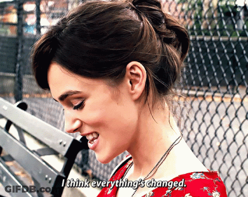 A Woman Sitting On A Bench With The Words " I Think Everything 'S Changed " Above Her GIF