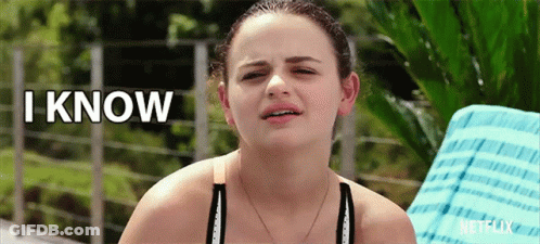 A Woman Sitting On A Chair With The Words " I Know " Above Her GIF
