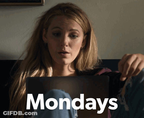 A Woman Sitting On A Couch Looking At A Laptop With The Word Mondays Written On The Bottom GIF