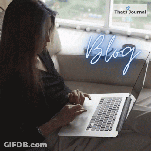 A Woman Sitting On A Couch Using A Laptop With The Word Blog Written In Neon GIF