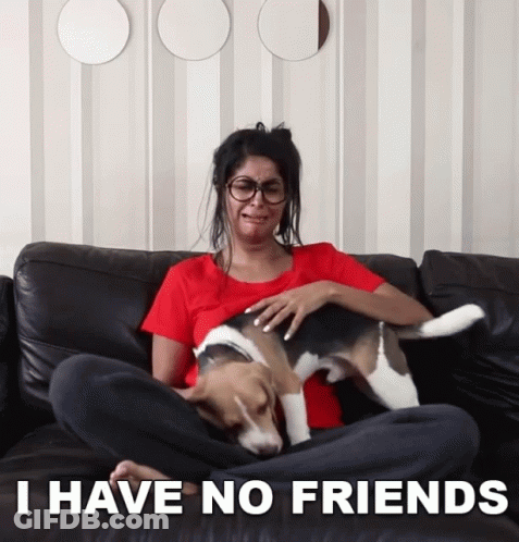 A Woman Sitting On A Couch With A Dog And The Words I Have No Friends GIF