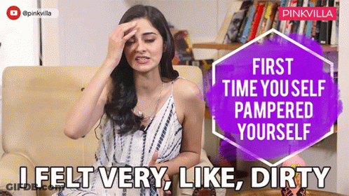 A Woman Sitting On A Couch With A Purple Sign That Says First Time You Self Pampered Yourself I Felt Very Like Dirty GIF