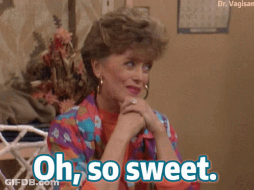 A Woman Sitting On A Couch With Her Hands Folded And The Words Oh So Sweet Above Her GIF