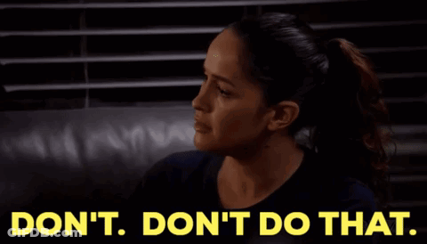 A Woman Sitting On A Couch With The Words " Do N't Do That " Written On The Bottom GIF