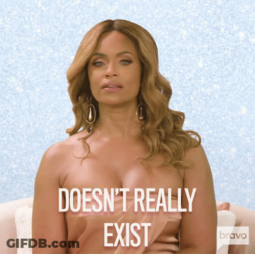 A Woman Sitting On A Couch With The Words " Doesn 'T Really Exist " Behind Her GIF