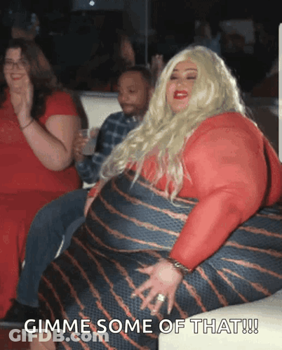 A Woman Sitting On A Couch With The Words Gimme Some Of That Written Below Her GIF