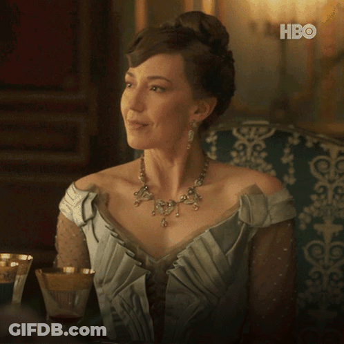 A Woman Sitting On A Couch With The Words I 'Ll Leave You To Your Point Above Her GIF