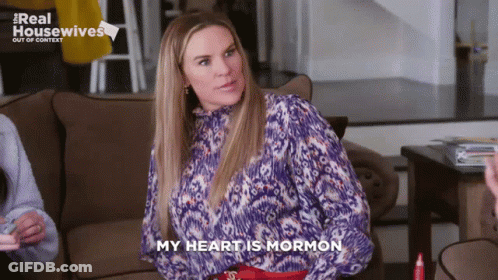 A Woman Sitting On A Couch With The Words My Heart Is Mormon GIF