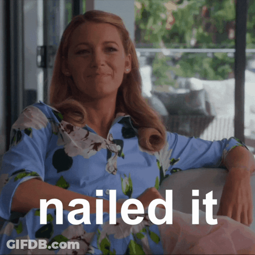 A Woman Sitting On A Couch With The Words Nailed It Written Below Her GIF