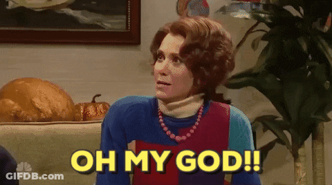 A Woman Sitting On A Couch With The Words Oh My God GIF
