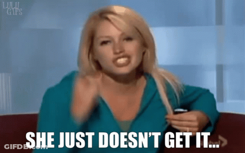 A Woman Sitting On A Couch With The Words She Just Does N't Get It GIF