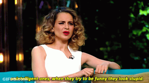 A Woman Sitting On A Couch With The Words Unintelligent Ones When They Try To Be Funny They Look Stupid GIF