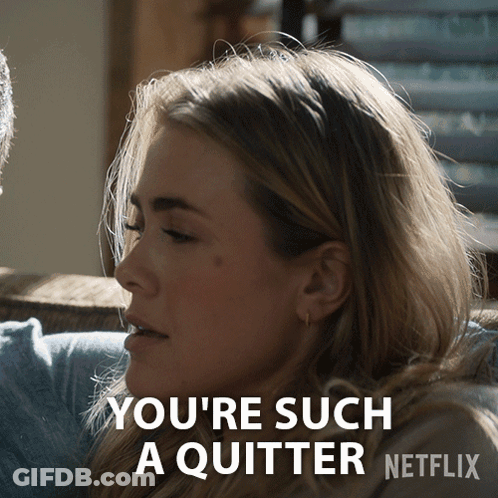 A Woman Sitting On A Couch With The Words You 'Re Such A Quitter GIF