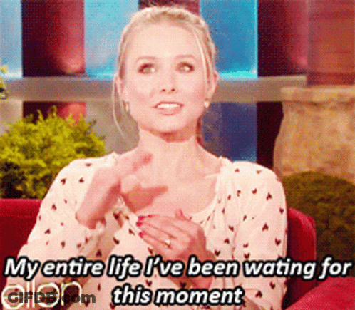 A Woman Sitting On A Red Couch With A Caption That Says " My Entire Life I 'Ve Been Waiting For This Moment GIF