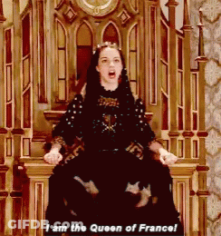 A Woman Sitting On A Throne With The Words " I Am The Queen Of France " Below Her GIF