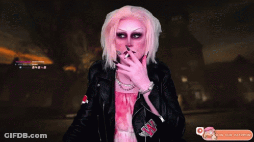 A Woman Smoking A Cigarette With A Join Our Patreon Button Below Her GIF