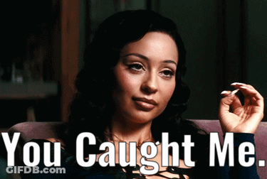A Woman Smoking A Cigarette With The Words " You Caught Me " Behind Her GIF