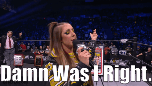 A Woman Speaking Into A Microphone With The Words Damn Was I Right Behind Her GIF
