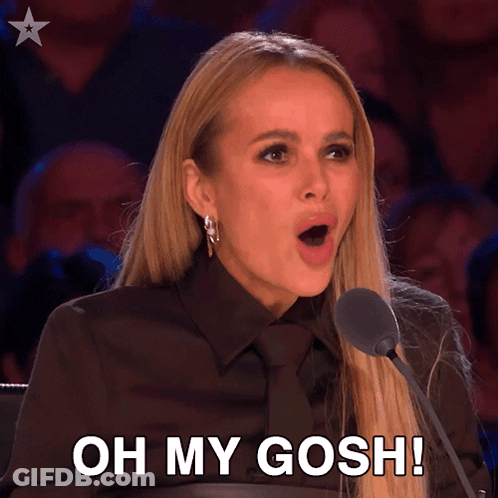 A Woman Speaking Into A Microphone With The Words Oh My Gosh GIF
