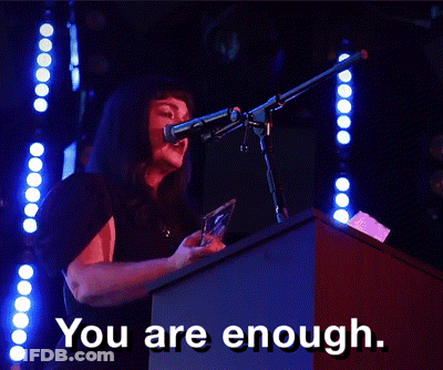 A Woman Speaking Into A Microphone With The Words You Are Enough GIF