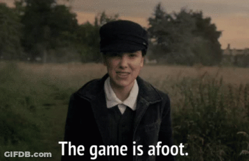 A Woman Standing In A Field With The Words The Game Is Afoot GIF