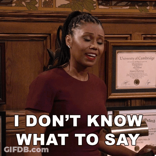 A Woman Standing In Front Of A Framed Diploma From The University Of Cambridge Says " I Don 'T Know What To Say " GIF