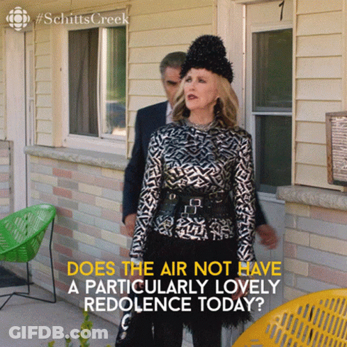 A Woman Standing In Front Of A House With The Words " Does The Air Not Have A Particularly Lovely Redolence Today " GIF