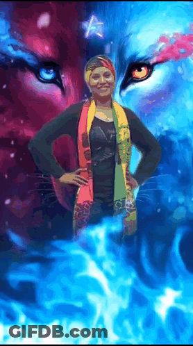 A Woman Standing In Front Of A Painting Of A Lion GIF