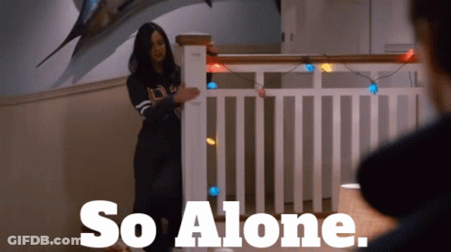 A Woman Standing In Front Of A Railing With The Words So Alone GIF