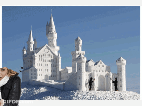 A Woman Standing In Front Of A Snow Castle GIF
