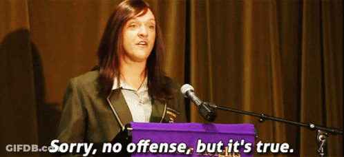 A Woman Stands At A Podium With The Words Sorry No Offense But It 'S True GIF