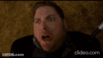 A Woman Stands In Front Of A Crowd At A Party With The Website Clideo.com Visible In The Corner GIF