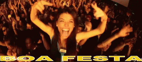 Woman Standing In Front Of Crowd With Boa Festa GIF