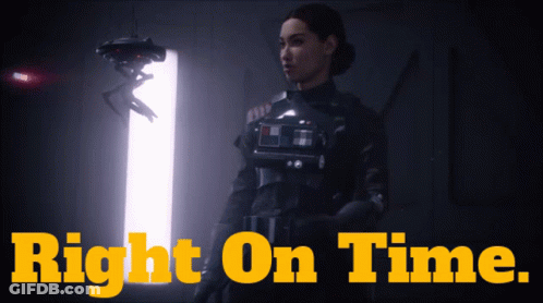 A Woman Stands In Front Of A Door With The Words Right On Time Written On It GIF