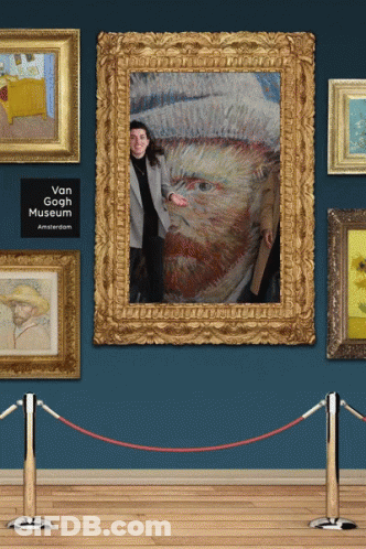 A Woman Stands In Front Of A Framed Portrait Of Vincent Van Gogh GIF