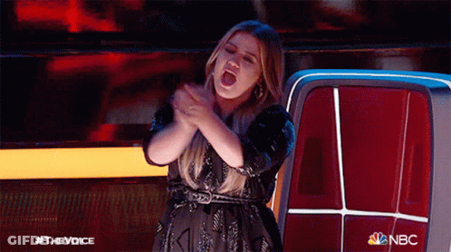 Woman Applauding In Front Of NBC Logo GIF